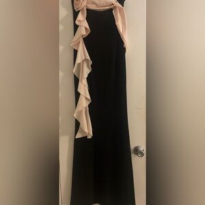 WORN ONCE!! Black long prom dress with pink ribbon that drapes down!!